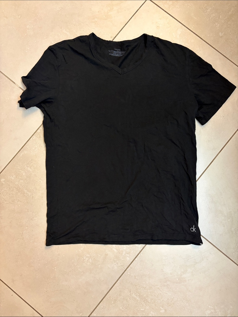 Calvin Klein Women’s Black V-Neck Tee with CK Hem Logo